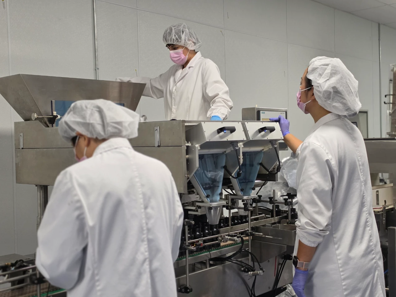 Ekang Nutra quality and production team maintaining ongoing cGMP compliance